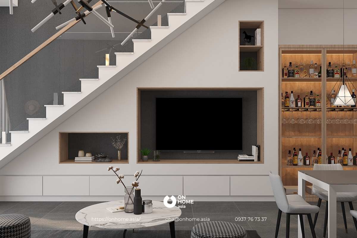 Tận dụng khu vực gầm cầu thang thành kệ tivi