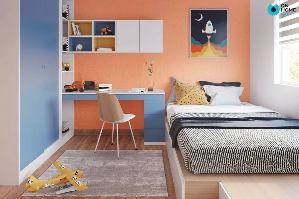 Căn phòng với tone màu cam – xanh thu hút.