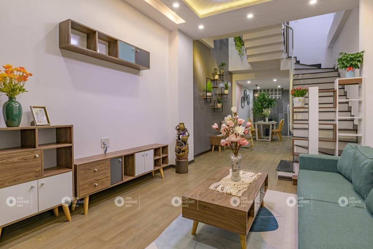 Trắng và xanh là hai gam màu chủ đạo cho thiết kế nội thất nhà phố 50m2 này