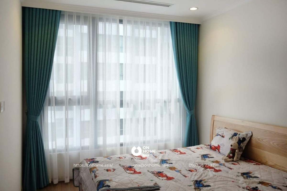 Rèm cửa trang trí phòng ngủ màu xanh đẹp