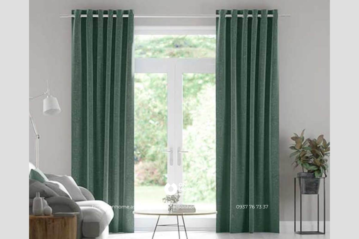 Rèm nhung màu xanh trang trí phòng khách hiện đại