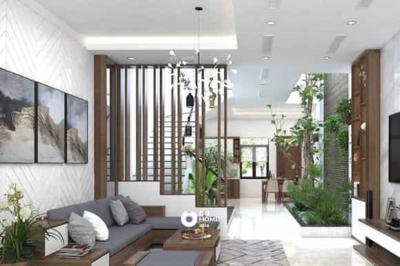 Vách ngăn phòng khách và cầu thang bằng gỗ